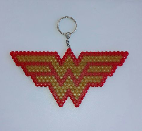 Wonder Woman Wonder Woman Perler Bead Patterns, Wonder Woman Perler Beads, Aquabeads Ideas, Easy Perler Bead Patterns, Keeping Busy, Perler Ideas, Melty Beads, Bead Ideas, Beaded Keychains