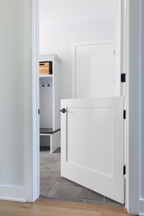 Mudroom Dutch-door Mudroom with Dutch-door This is perfect if you have pets and need to contain them - especially if it's a puppy in training Mudroom Dutch-door Mudroom with Dutch-door #Mudroom #Dutchdoor #Mudroomdoor Gray Laundry Room, Laundry Room And Mudroom, Mudroom Paint Color, Cat Gate, Grey Laundry Rooms, White Laundry Rooms, Garage Door Types, Garage Door Styles, Oil Rubbed Bronze Hardware