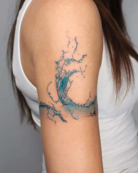 50 Beach Tattoo Ideas: Inspiring Designs for Ocean Lovers Wrist Watercolor Tattoo, Water Themed Tattoos For Women, Sea Lover Tattoo, Beach Tattoo Ideas, Wave Tattoos, Wave Tattoo Design, Tato Minimal, Water Splashing, Sea Tattoo