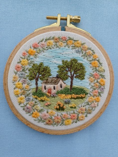 Detailed hand embroidered cottage and flower landscape. flower border/vintage colours/cottage/embroidery decor/art/thread art/ www.Etsy.com/shop/frenchknotcreations Brick Embroidery, Cottage Embroidery, Embroidered Cottage, Embroidered House, Farm Embroidery, House Embroidery, Embroidery Decor, Landscape Embroidery, Vintage Colours