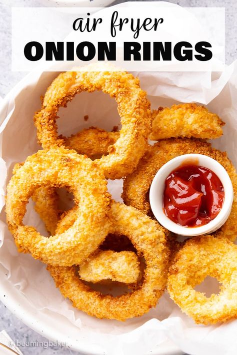 Crispy, crunchy Air Fryer Onion Rings are thick, flavorful, and coated with an unbelievably crispy golden panko crumb. Made with SO much less oil than regular onion rings!Recipe from Beaming Baker. Air Fryer Frozen Onion Rings, Air Fryer Xl Recipes, Frozen Onion Rings, Air Fryer Onion Rings, Beaming Baker, Cajun Seasoning Recipe, Homemade Onion Rings, Onion Rings Recipe, Sweet N Spicy