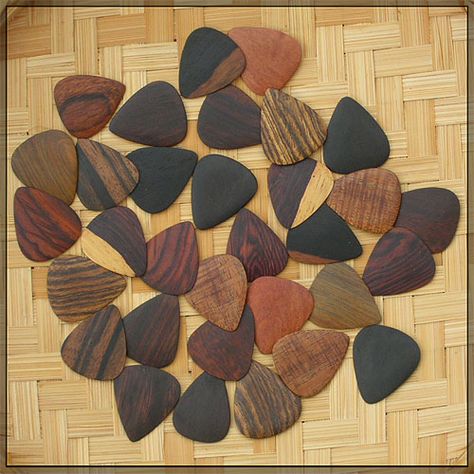 Guitar wood picks by Sleipner Gtr, via Flickr Cool Guitar Picks, Guitar Wood, Wood Guitar Pick, Snake Wood, Guitar Jewelry, Rare Guitars, Wood Guitar, Ukulele Lesson, Guitar Acoustic