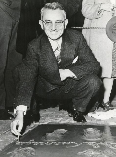 Dale Carnegie, signing his concrete slab at Grauman's Chinese Theatre. His book, 'How To Win Friends and Influence People' of 1936 is a classic and still relevant self-help book. Dale was born on November 24, 1888 in Maryville, Missouri. Image via Alamy Maryville Missouri, Influence People, Chinese Theatre, How To Influence People, Dale Carnegie, Concrete Slab, Self Help Book, Missouri, Self Help