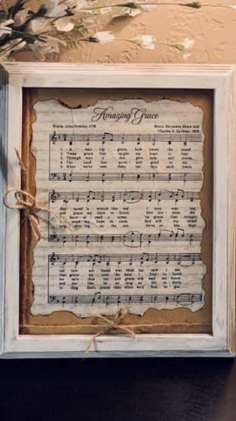 Christmas Sheet Music Crafts, Hymn Board Repurposed, Hymnal Art, Decorating With Music Sheets, Old Hymnal Crafts, Crafts Using Hymnal Pages, Hymnal Page Crafts, Christmas Crafts With Hymnal Pages, Framed Hymnal Pages