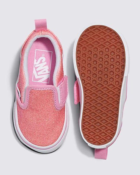 A Slip-On Made Specifically for Little Feet The Toddler Slip-On V Glitter remakes our Classic Slip-On with little ones in mind. By adding side hook-and-loop closures and heel pulls to this glittery style, an everyday essential is given a better fit for small feet, and has even easier on-and-off access, too. Iconic Slip-On shoe made for toddlers Side hook-and-loop closures Heel pull tabs Low profile synthetic uppers Glitter and metallic upper executions Supportive padded collars Elastic side accents Signature rubber waffle outsoles Ellie Core, Waterproof Baby, Kids Wardrobe, Shoe Inspiration, Glitter Shoes, Girl Shoes, Clothing Essentials, Girl Style