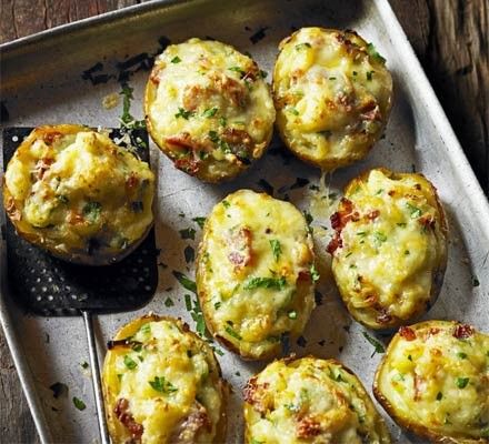 Cheesy Baked Potatoes, Bonfire Food, Bonfire Night Food, Jacket Potatoes, Roasted Onions, Baked Potato Recipes, Bbc Good Food, Night Food, Cheese Topping