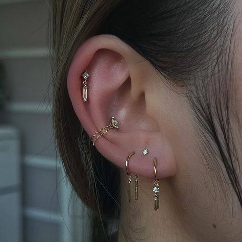 loving this curation from yesterday ✨ added a fresh upper ear and high lobe and restyled everything else . we love a good chain and drippp… | Instagram Three Lobe Piercings And Two Cartilage, Micro Lobe Piercing, Floating Lobe Piercing, Big Ear Lobe Piercing, Stacked Lobes Piercing, Triple Love Piercing, Ear Piercings Upper Lobe, Inner Lobe Piercing, Upper Lobe Piercing Ideas