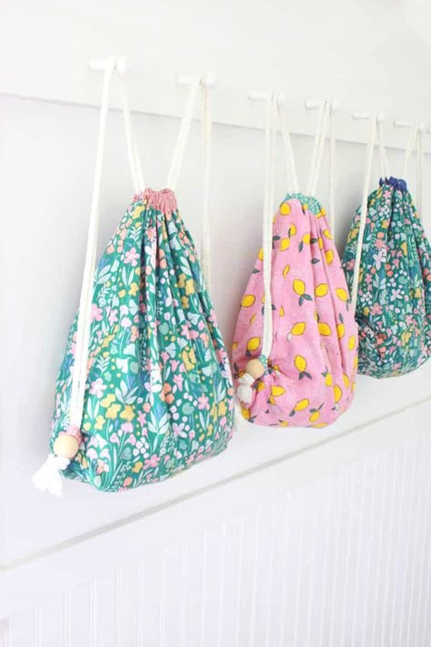 How To Sew A Drawstring Backpack - Easy Tutorial With Pictures Diy Drawstring Backpack Pattern, Easy Sewing Backpack, How To Sew A Drawstring Backpack, Diy Drawstring Bag Backpack, How To Sew Backpack, Easy Backpack Sewing Pattern, Draw String Backpack Pattern Free, Easy Drawstring Bags To Sew, Kids Bags To Sew