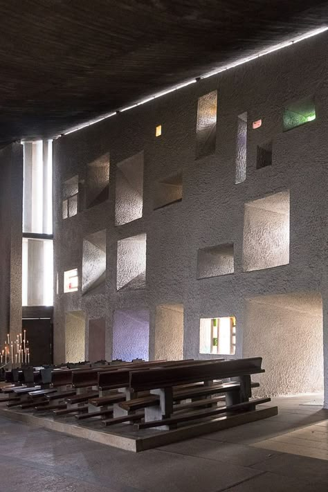 Inside the chapel of Notre Dame du Haut - Ronchamp, France - a chapel by Le Corbusier and a UNESCO World Heritage site - www.RoadTripsaroundtheWorld.com Le Corbusier Ronchamp, Le Corbusier Notre Dame Du Haut, Ronchamp Chapel, Le Corbusier Interior, Ronchamp Le Corbusier, Corbusier Interior, Corbusier Architecture, Le Corbusier Architecture, Church Building Design