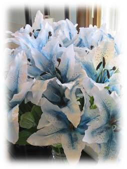 For Nathan & Charity's wedding.  Charity's favorite flower is a blue Stargazer Lily.  She wanted the blue center on a white lily.  Could not find them.  Bought plain white and dyed the centers using Stampin' Up's Pacific Blue ink.  These will be used in the bridal bouquet and on bridal party table.  (Now if I could just get the blue ink off my hands!) :-) Lilly Bouquet Wedding, Blue Stargazer Lily Bouquet, Stargazer Lily Bouquet, Bridal Party Tables, Lily Bouquet, Stargazer Lily, Blue Wedding Flowers, White Lilies, Blue Roses