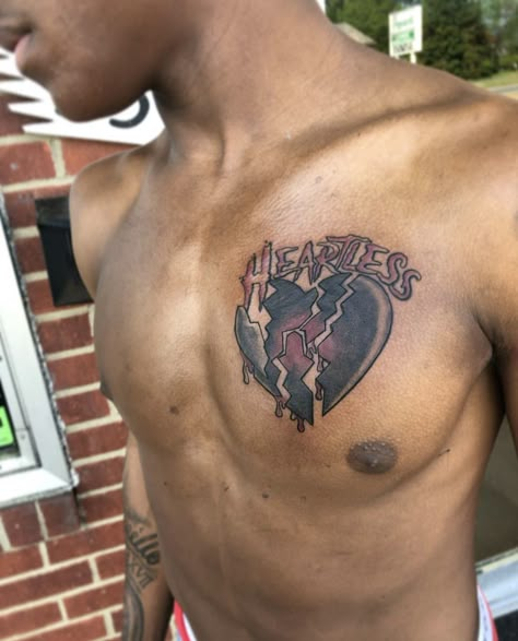 Small Hood Tattoos, Heartless Tattoo Men, No Love Tattoo Men, Half Chest Tattoo Men Ideas Unique, Chest Tattoo Men Ideas Black Man, Explore Tattoo Ideas, Black Male Tattoos, Half Chest Tattoo Men Ideas, Trap Tattoos Men