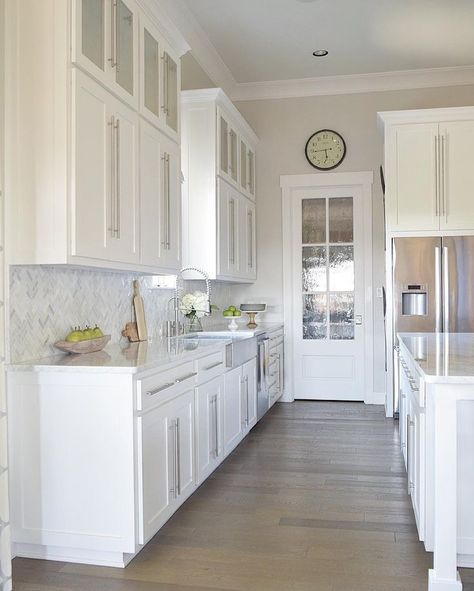 Gorgeous white kitchen with white carrara marble and white cabinets http://www.zdesignathome.com Galley Kitchen Remodel Ideas, Gorgeous White Kitchen, Galley Kitchen Design, Galley Kitchen Remodel, Small Condo, Galley Kitchens, Kitchen Cabinets Makeover, Kitchen Cabinet Remodel, White Kitchen Design