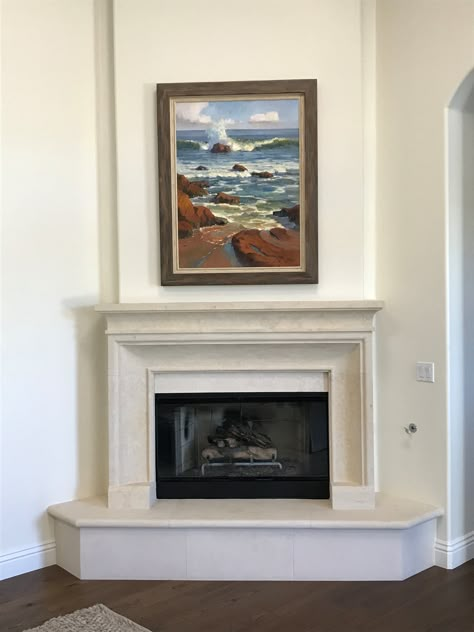 Transitional Fireplace Surround with Raised Hearth in White Cream Limestone Corner Fireplace Raised Hearth, High Hearth Fireplace, Raised Fireplace Ideas, Round Corner Fireplace, Corner Fireplace Hearth, Mantle Upgrade, Fireplace Corner Ideas, Raised Fireplace Hearth, Fireplace With Raised Hearth