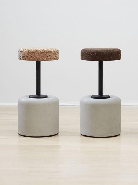 Add a touch of elegance to your indoor living or entertaining area with these beautifully crafted counter & bar stools made from natural light or dark cork, natural grey concrete, and powder-coated mild steel. Built-in ball bearings allow each stool to swivel smoothly. The 100% recyclable cork material is not only durable but also eco-friendly and sustainable. Key Features: Seats crafted from natural, recyclable, light or dark cork. Dark cork suitable for outdoor use. Sturdy concrete base for a solid foundation. Frames constructed with powder-coated mild steel. Equipped with built-in ball bearings for a smooth, 360-degree swivel. Built to withstand the wear and tear of everyday use. Designed by the globally acclaimed Laurie Wiid van Heerden. These stools are perfect for modern homes and ca Concrete Room, Concrete Stool, Mobile Coffee Shop, Mobile Coffee, Marble Bar, Shop Stool, Stone Bar, Textile Wall Hangings, Cork Material