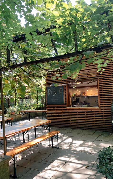 Coffee Shop In The Forest, Nature Cafe Outdoor, Native Coffee Shop Design, Greenhouse Coffee Shop Garden Cafe, Green House Coffee Shops, Coffee Shop Garden Outdoor, Park Cafe Design, Cafe In The Woods, Garden Cafe Design Outdoor Coffee Shop