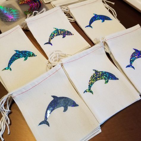 Loving these dolphin bags! 💜🐋 Ocean Baby Shower Theme, Dolphin Birthday, 31 Party, Honey Wedding Favors, Mirror Keychain, Ocean Theme Party, Nautical Party, Muslin Bags, Beach Wedding Favors