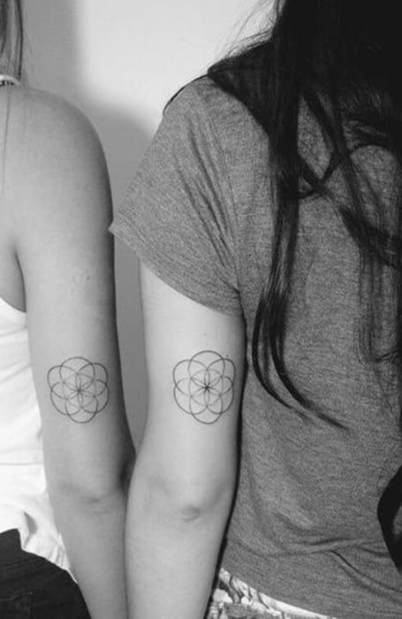 30 Beautiful Flower Tattoos for Women & Meaning - The Trend Spotter Seed Of Life Tattoo, Beautiful Flower Tattoos For Women, Coldplay Tattoo, Dainty Flower Tattoos, Flower Tattoos For Women, Flower Of Life Tattoo, Simple Flower Tattoo, Magnolia Tattoo, The Trend Spotter