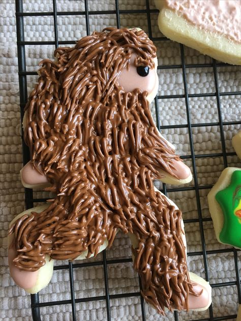 Emili's Sasquatch and Big Foot Cookies Bigfoot Cookies Decorated, Bigfoot Cookies, Bigfoot Desserts, Big Foot Party Ideas, Sasquatch Cake Ideas, Sasquatch Cookies, Sasquatch Cookies Decorated, Sasquatch Birthday Cake, Sasquatch Party Food