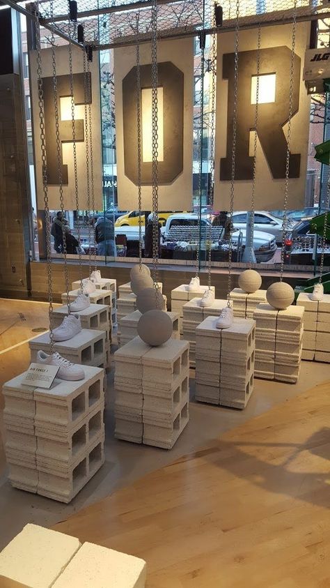 Nike Store Display, Concrete Block Table, In Store Signage, Concrete Display, Wheat Paste, Merchandise Display, Sneaker Displays, Window Signage, Harlem New York