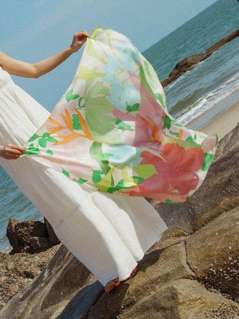 Inspired by our enchanting trip to Colombia and the vibrant nature of beautiful Cartagena, this large silk scarf showcases the lush flowers of this tropical city, radiating a summer and relaxing vibe. Perfect for a holiday getaway, this luxurious silk scarf with its colorful floral designs can be styled in numerous ways — from a sun-blocking shoulder cover to a chic head wrap to a breezy beach skirt. Embrace "Cartagena," your ultimate versatile accessory of the season! 100% mulberry silk  dry clean Tropical City, Trip To Colombia, Holiday Getaway, Large Silk Scarf, Silk Scarf Hair, Dad Jewelry, Cute Scarfs, June Birthstone Jewelry, Silk Pocket Square