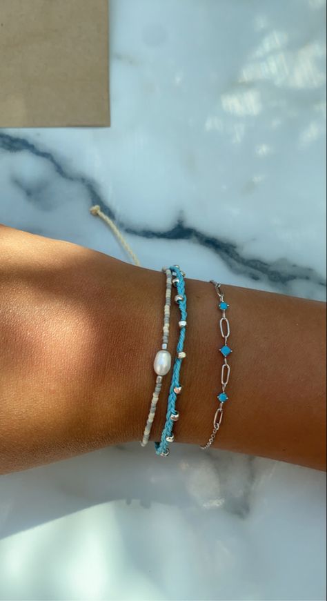 pretty blue bracelet aesthetic Blue Summer Bracelets, Blue Bracelets Aesthetic, Greece Jewelry Aesthetic, Blue Bracelet Stack, Summer Jewelry Silver, Summer Bracelets Aesthetic, Greece Bracelet, Blue Summer Jewelry, Light Blue Bracelet