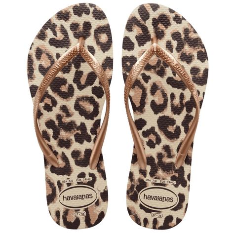 Havaianas Leopard Print Flip Flops Rose Gold Womens 11/12 Nwot Take A Walk On The Wild Side In The Slim Animals Flip Flop. Featuring The Animal Prints You Love, In Fresh And Vibrant Colors. Finished With A Tonal Havaianas Logo On Slim Metallic Straps. Details Thong Style Cushioned Footbed With Textured Rice Pattern And Rubber Flip Flop Sole Made In Brazil Printed Flip Flops, Rubber Flip Flops, Havaianas Flip Flops, Summer Flip Flops, Dream Shoes, Saint Tropez, Summer Essentials, Walk On, Flip Flop