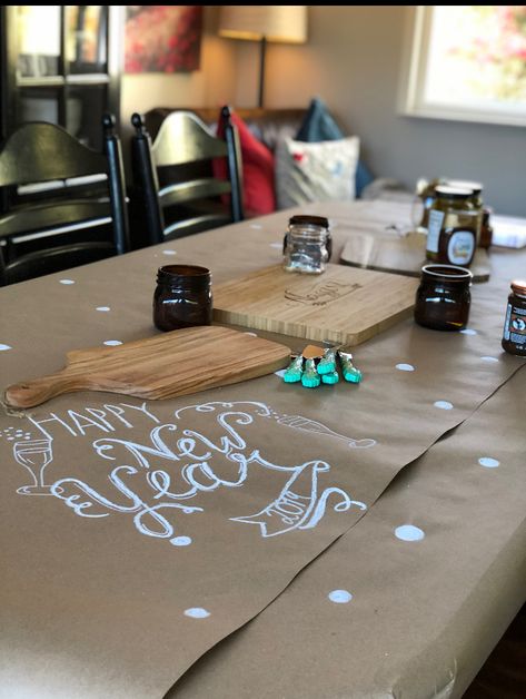 Got butcher paper from target is in office section and cover the table with it and drew some disingenuous. Paper Table Runner, Hosting Holidays, Paper Table, Paper Board, Butcher Paper, Chalkboard Art, Paper Cover, Brown Paper, Bat Mitzvah