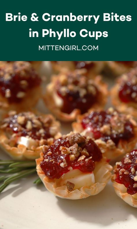 This easy recipe features a spiced, homemade cranberry compote and creamy brie cheese in crispy phyllo shells. Ready in 25 minutes, this Brie Cheese and Spiced Cranberry Bites Appetizer is sure to be a crowd pleaser at your next holiday party or Christmas dinner. Cranberry Bites Appetizer, Brie And Cranberry, Phyllo Shells, Cranberry Bites, Creamy Brie, Brie Cranberry, Cranberry Compote, Friendsgiving Food, Phyllo Cups