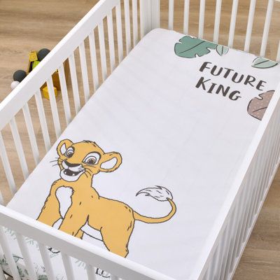 The Disney Lion King Future King Photo Op Fitted Crib Sheet is the perfect addition to your safari themed nursery. This fun pattern features Simba playing among the leaves with a colourful leaf border and words that say "Future King". Comes in shades of teal, sage, taupe and gold. Designed to create the perfect photo opportunity by capturing baby's milestones and special moments and measures 28" x 52" x 8". Includes full elastic edges for a safe and snug fit. Fits a standard size crib mattress a Disney Animals Nursery, The Lion King Nursery Theme, Lion King Nursery Theme, The Lion King Nursery, Baby Boy Nursery Disney, Winnie The Pooh Nursery Theme, Disney Nursery Ideas Gender Neutral, Lion King Nursery Boy, Lion King Baby Nursery