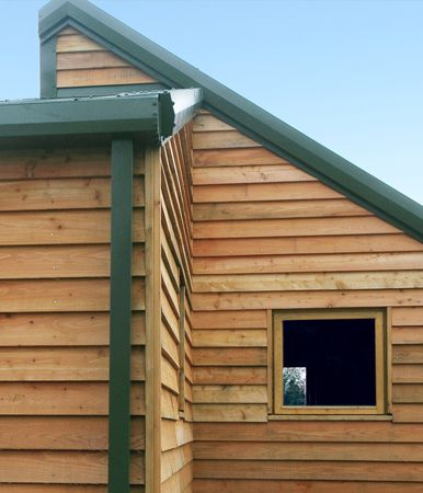 British larch cladding feather edge Feather Edge Cladding, Porch Cladding, Timber Clad Extension, House Siding Ideas Exterior, Exterior Cabin, Wood Cladding Exterior, Cladding Ideas, Cladding Exterior, Garage Construction