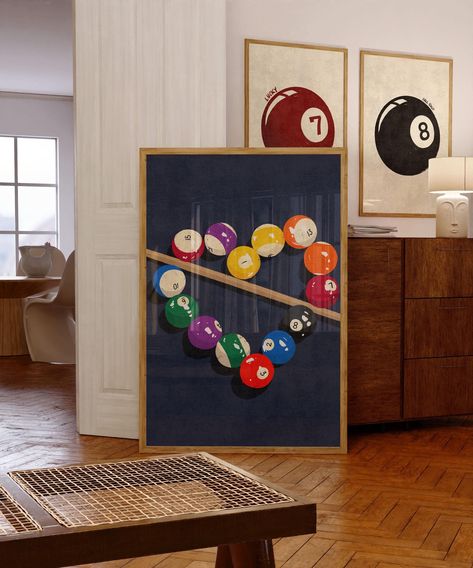 🎱 Retro Billiard Balls Poster 🎱 Elevate your space with this trendy retro wall art featuring a colorful billiard ball set. Perfect for game rooms, college dorms, or any space needing a touch of Y2K inspired decor, this aesthetic poster brings a playful and vintage vibe to your walls. The design highlights a complete pool ball set arranged in a dynamic composition, paired with vibrant retro colors that capture the essence of classic 70s style. This print is ideal for those looking to add a nost Pool Room Aesthetic, Pool Ball Art, Pool Ball Decor, Billard Aesthetic, Pool Table Decor, Game Room Idea, Vintage Pool Table, Pool Table Room Decor, Billiard Room Decor