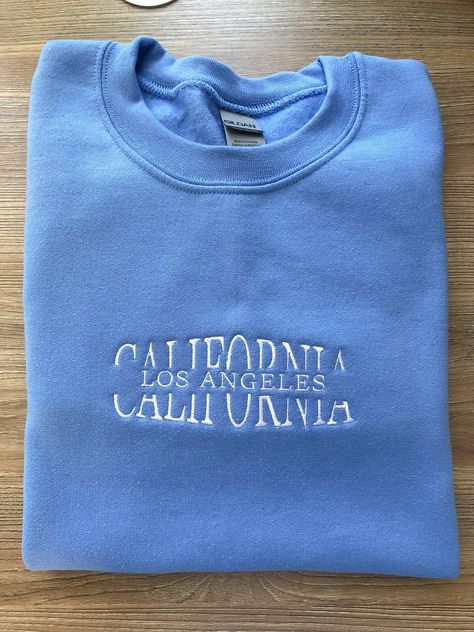 If you want a custom order or have any questions, please message me! -Los Angeles California embroidered crewneck -50/50 cotton/polyester -Unisex sizing: fits true to size. Order one size up for a looser fit. Gifts For Best Friends, Embroidery Monogram, Los Angeles Style, Embroidered Crewneck, Embroidered Sweatshirt, Jumper Shirt, Gifts For My Boyfriend, Cute Everyday Outfits, Embroidered Sweatshirts