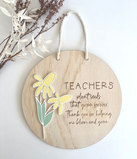 Are you looking for a unique and personalised teachers/educators gift?Our Personalised end of year teacher's gift will be a beautiful personalised end of year thank you gift to an educator and can be displayed year after year.Round Plaque wood sign personalised and with engraved message  or you can choose your own message to put in the plaque.Measures approx : 20cm  As Wood is a natural material. The colour and grain of the wood will vary. I don't have control of each piece of wood and the Wooden Personalised Gifts, Laser Cut Teacher Gifts, Wood Plaques Ideas Diy, Wooden Teacher Gifts, Wood Plaque Ideas Diy, Teacher Thank You Gift Ideas, Teacher End Of Year Gifts, Engraved Teacher Gifts, Unique Teacher Gifts