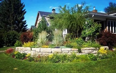 Corner lot landscaping. Landscaping Corner Lot, Front Yard Wall, Corner Lot Landscaping, Brick Landscaping, Corner Landscaping, Outdoor Landscape Design, Retaining Wall Design, Landscaping Inspiration, Landscaping Front Yard