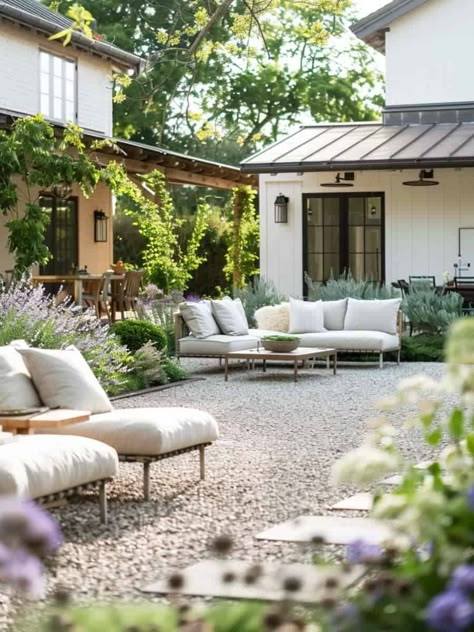 30 Gorgeous Gravel Patios: Affordable Outdoor Elegance Historic Home Backyard, Wood Backyard Patio, English Garden Patio Furniture, Outdoor Kitchen On Gravel, Modern Farmhouse Backyard Patio, Garden Pebble Ideas, Pea Gravel Dining Area, Pea Gravel Backyard Landscaping, European Garden Patio