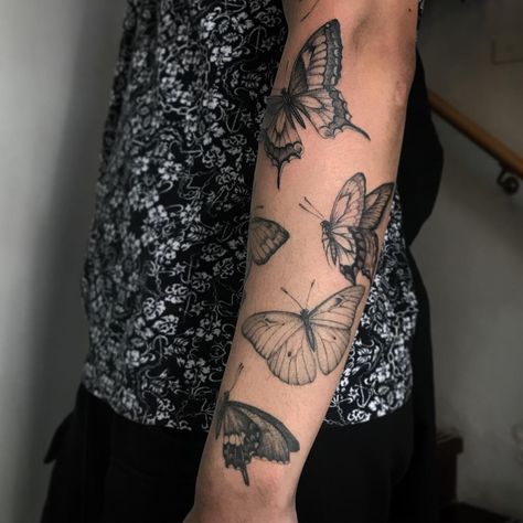 Butterfly Tattoo On Sleeve, Sleeve Of Butterflies Tattoo, Butterfly Patchwork Sleeve Tattoo, Butterfly Fill In Tattoo, Negative Butterfly Tattoo, Butterfly Collage Tattoo, Pinned Butterfly Tattoo, Nature Butterfly Tattoo, Butterfly Cluster Tattoo