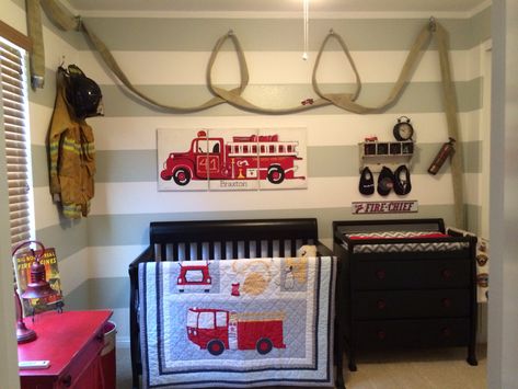 Firefighter nursery with hose Firefighter Bedroom Ideas Kids, Firefighter Nursery Baby Boy, Fireman Nursery, Firefighter Nursery, Fireman Room, Firefighter Bedroom, Fire Truck Bedroom, Fire Truck Room, Firefighter Room