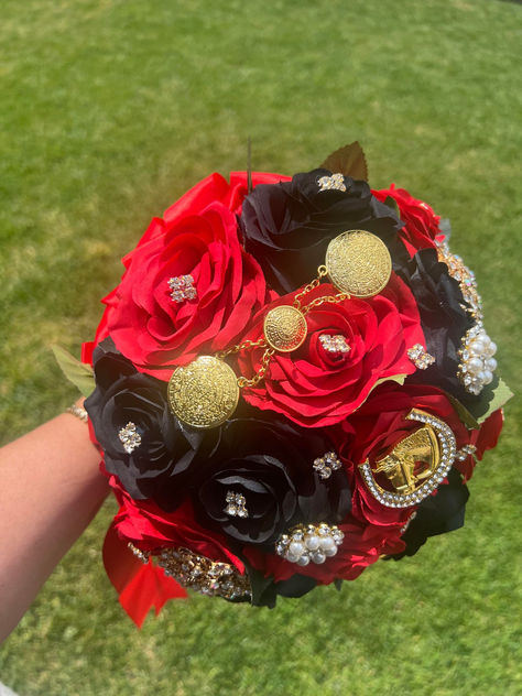 Red and Black Roses with Horseshoe and Aztec Mexican Metal Brooches

Finished off with Rhinestones and Gold Crystal Brooch. Quince Bouquet Red And Black, Black And Red Quince Ramo, Quinceanera Charro Theme Decorations, Quensenara Ideas, Quinceanera Charro Theme, Black And Red Quince, Black And Red Bouquet, Charro Wedding Ideas, Black Quinceanera Theme