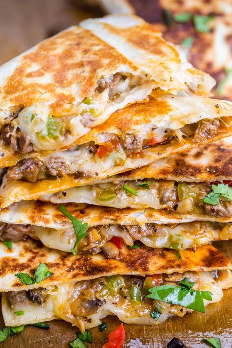 Philly Cheesesteak Quesadillas - Done in under 30 minutes and a make-ahead recipe. Flour tortillas filled with steak and cheese cooked until the tortillas as crisp and cheese is melted. #phillycheesesteakquesadilla #cheesesteakquesadilla #quesadillarecipe #quesadillas #natashaskitchen Steak Quesadilla Recipe, Best Quesadilla Recipe, Cheese Steak Quesadillas, Quesadilla Recipes Beef, Steak Quesadilla, Quesadilla Recipes Easy, Quesadilla Recipe, Weight Watchers Chicken, Quesadilla Recipes