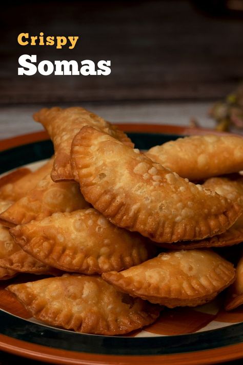 Somas is a popular and traditional #FestiveSnack made during Diwali in most homes. This #Karanji is made using maida, rava, and sugar. You can now make this #Somas with Cookd’s simple recipe. Do try this recipe and share your feedback with us. Indian Somas, Diwali Special, Recipe Videos, Indian Sweets, Simple Recipe, Diwali, Food Videos, Easy Meals, Snacks