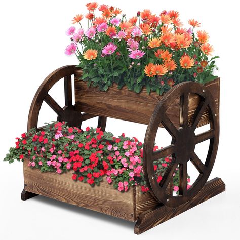 PRICES MAY VARY. Package Inclusions: this purchase comes with 1 wagon shaped wood planter box; A good mower for your gardening needs, it also includes carriage flower pots and accessories that are straightforward to install, optimizing your gardening experiences Quality Pine Wood Construction: relish the longevity and robustness of this wooden planter box; Crafted from quality pine wood, this planter exhibits reliable durability that will withstand the test of time; It undergoes an expert combus Wagon Decor, Wagon Planter, Front Porch Planters, Garden Wagon, Wooden Cart, Outdoor Patio Garden, Indoor Outdoor Patio, Wooden Wagon, Wood Pots