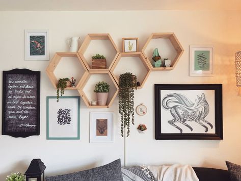 Hexagon Floating Shelves Living Room, Wall Collage Shelves, Hexagon Shelves Dining Room, Gallery Wall With Hexagon Shelves, Hexagon Shelf Decor Living Rooms, Honeycomb Shelves Living Room, Hexagon Shelves Behind Couch, Hexagon Wall Decor Ideas, Hexagon Shelves Decor Ideas