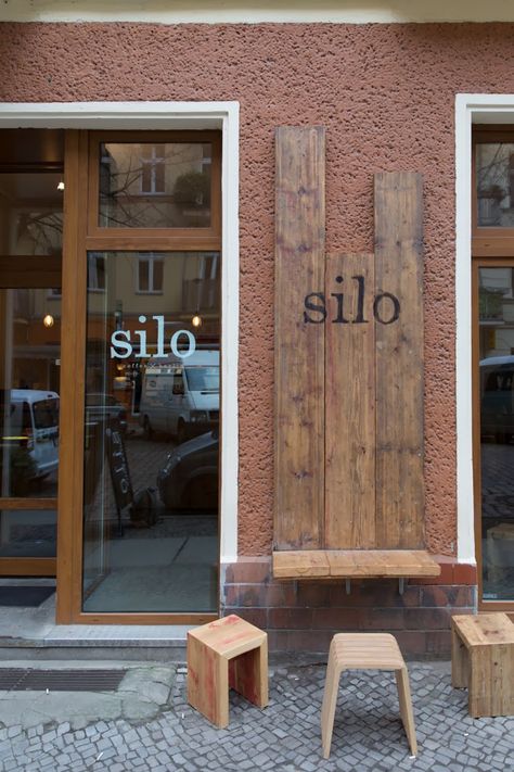 Silo coffee in Berlin Coffee Shop Entrance, Coffee Shop Sign, Font Idea, Coffee Shop Signs, Street Wall, Kursi Bar, Charred Wood, Coffee Places, Modern Restaurant