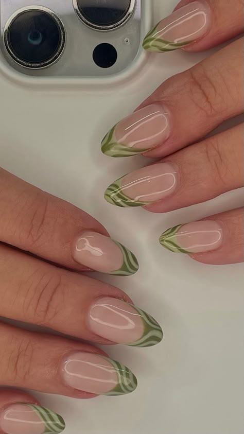 sage green nails, nail aesthetic, nail inspo, trendy nails, gelx nails, gel extensions, green nails, light green nails, zebra nails, abstract green nails, french tip nails, baddie nails, cute girl nails, clean girl nails, simple nails, nail vibes, hailey bieber nails, almond nails, short nail designs, fall nail designs, 2023 nails, tiktok nails, fun nails, nail photos, nail aesthetic, green aesthetic, deep v cut french nails , nails of the day, nail boards Sage Green French Tip Nails Almond Short, Sage Green Nails Aesthetic, Light Green French Nails, Sage French Tip Nails Almond, Green Nails Acrylic Almond French Tip, Short Almond Green French Tip Nails, Nails 2024 Almond, Sage Green Almond French Tips, Light Green Almond Nails