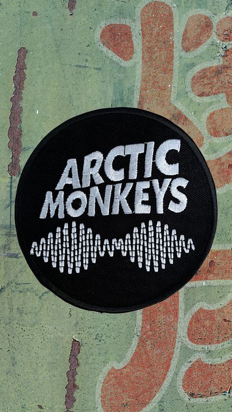 A BLACK AND WHITE COLOURED, CIRCULAR SHAPED ARCTIC MONKEYS EMBROIDERED SEW OR IRON ON PATCH Monkey Logo, Battle Jacket, Artic Monkeys, Patches Jacket, Arctic Monkeys, Logo Embroidered, Cute Fits, Embroidered Patches, Rock Music