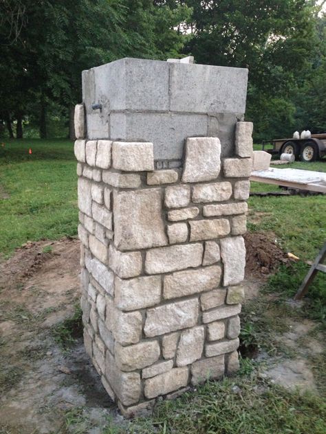 Limestone veneer posts Stone Driveway Pillars, Diy Stone Veneer Exterior, Covered Driveway Entrance, Driveway Pillars, Limestone Veneer, Driveway Entrance Landscaping, Ranch Gates, Brick Columns, Driveway Entrance