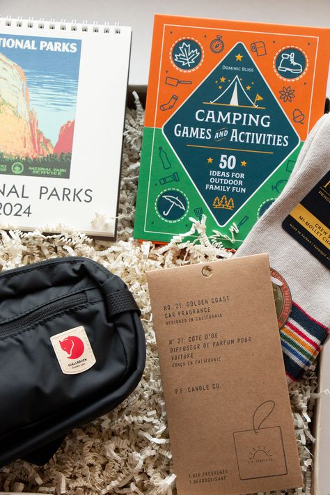 Our outdoor enthusiast gift set is tailored for those who embrace nature's beauty and adventure. Whether they're hiking, camping, or simply exploring, these thoughtfully curated gifts will enhance their outdoor escapades and keep them well-equipped for the wilderness. Each set includes: Fjallraven Hip Pack: Light, compact and perfect for all your small essentials you don’t want to leave at home – a minimalistic hip pack made from 100% recycled, waterproof nylon. National Parks 2024 Desk Calendar Mens Hiking Gifts, Embrace Nature, 5 Gifts, Camping Games, Gift Bundles, Desk Calendars, Outdoor Games, Camping And Hiking, Curated Gifts