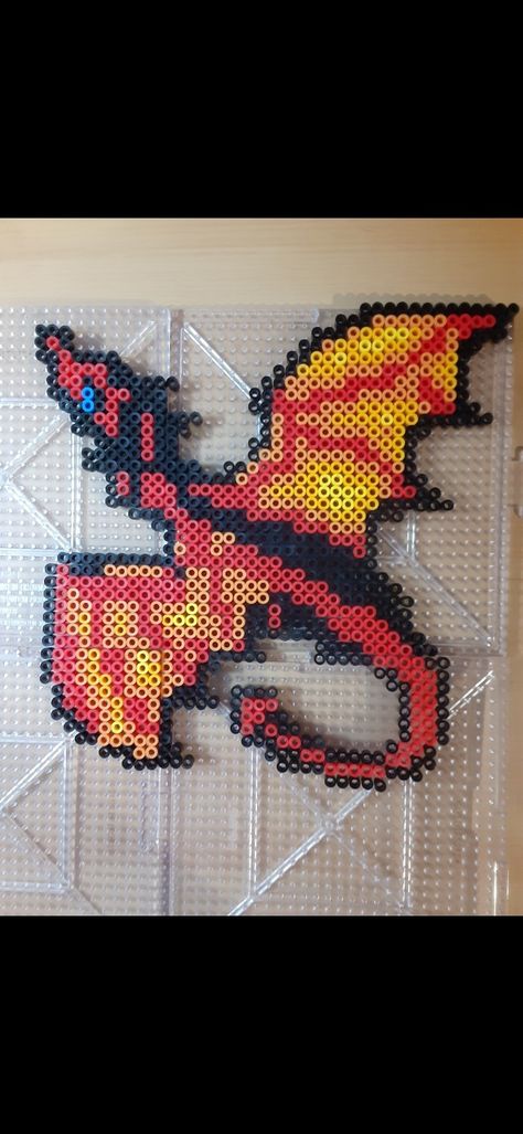 Liam's fire dragon Wings Of Fire Pixel Art, Wings Of Fire Perler Beads, Perler Bead Patterns Dragon, Dragon Perler Bead Patterns, Perler Bead Dragon, Dragon Perler Beads, Perler Designs, Easy Perler Bead Patterns, Pearl Beads Pattern