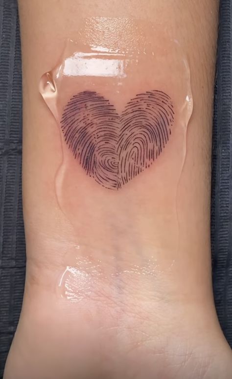 Tattoo Ideas To Get For Your Girlfriend, Tattoo Heart Fingerprint, Two Fingerprints Heart Tattoo, Heart Shape Fingerprint Tattoo, Finger Print Heart Tattoo Couple, Two Thumb Print Heart Tattoo, Couples Thumbprint Heart Tattoo, Small Memorial Tattoos Grandpa, Couple Thumb Print Tattoo