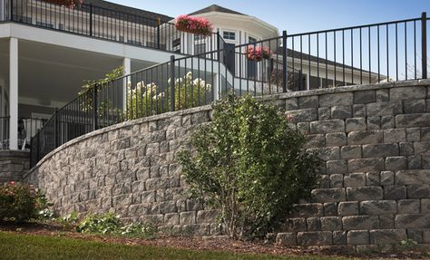 Fence Around Retaining Wall, Backyard Pool Fence, Hillside Patio, Retaining Walls Ideas, Tiered Backyard, Pool Retaining Wall, Retaining Wall Fence, Yard Stones, Backyard Retaining Walls